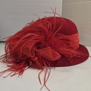 Vintage-Inspired Red Felt Cloche Hat with Bow and Feather Trim
